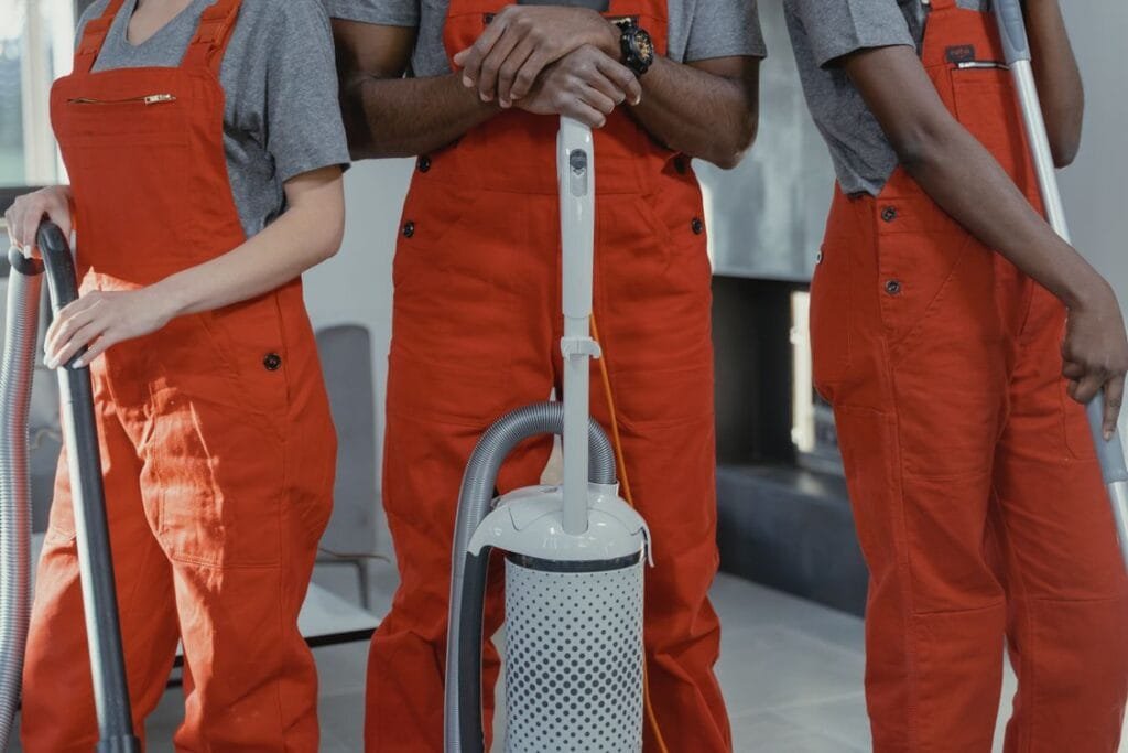 Professional cleaning team in UAE free zone business setup 2026