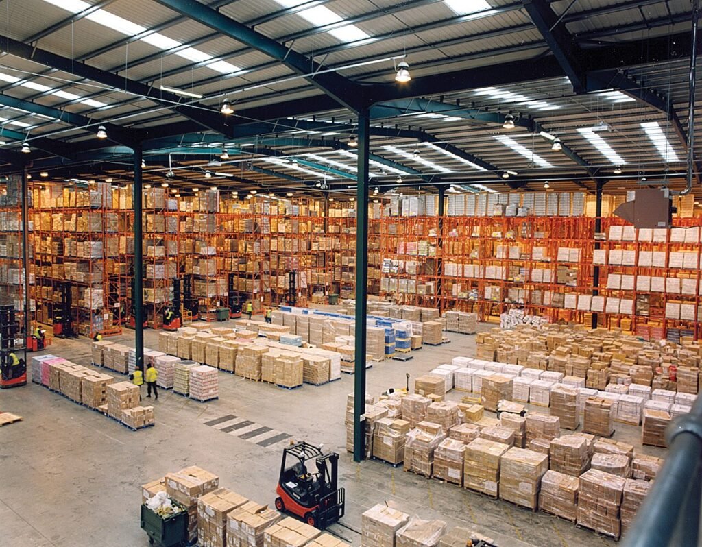 Modern warehouse interior with pallet racking illustrating UAE free zone warehouse cost benchmarks for 2026