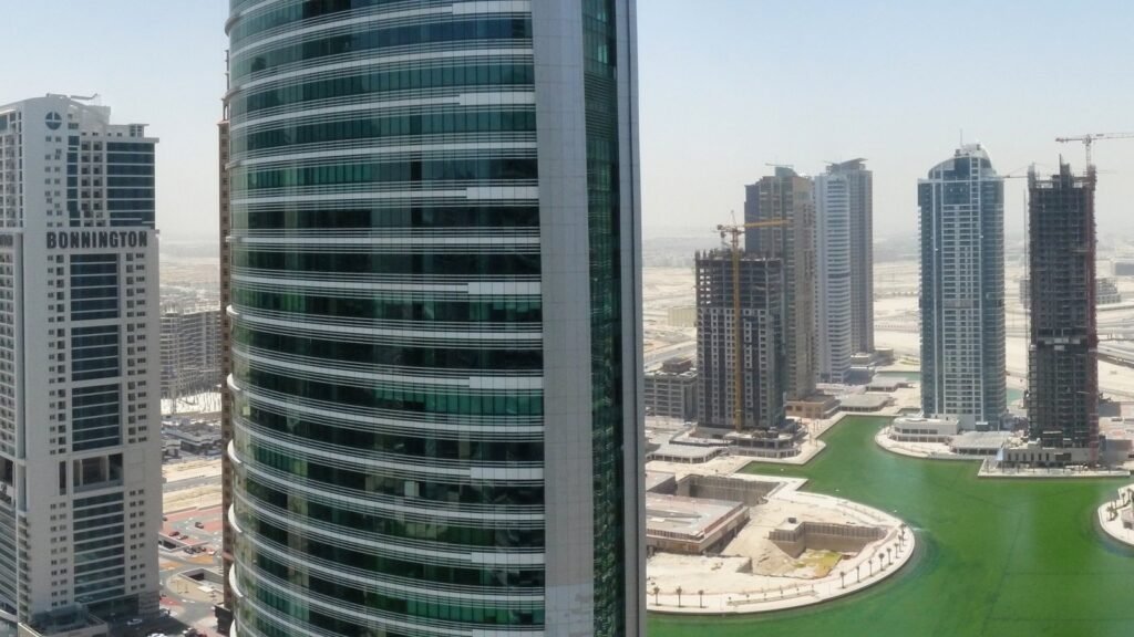 Jumeirah Lakes Towers in Dubai, the DMCC district where free zone office lease charges are published in full