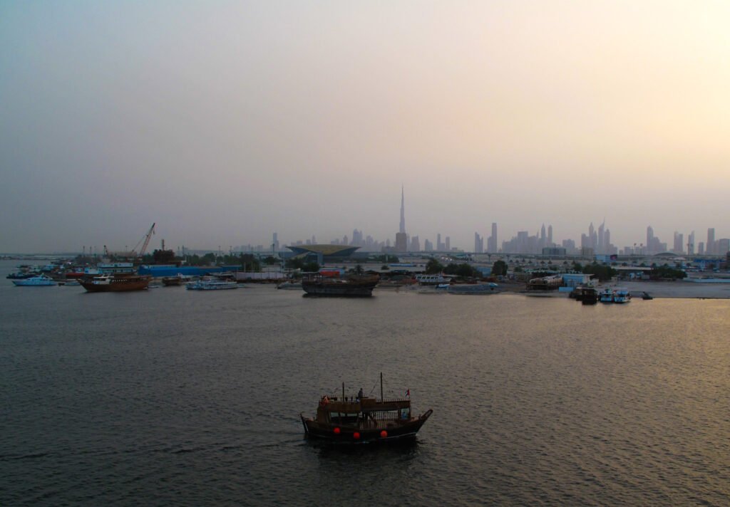Dubai Creek waterfront with boats and yachts, UAE