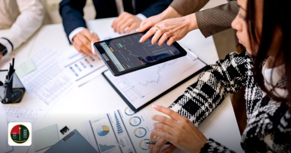 UAE free zones digital marketing agencies 2026 – Top Picks - business professionals reviewing analytics on a tablet during