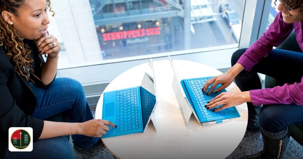 Can I Register a Company in UAE Without a Physical Office? – All You Need to Know - two women working on laptops in a modern