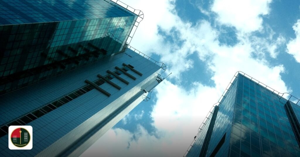 Relocating Business to UAE Free Zone Checklist 2026 - low angle view of modern glass skyscrapers with clouds