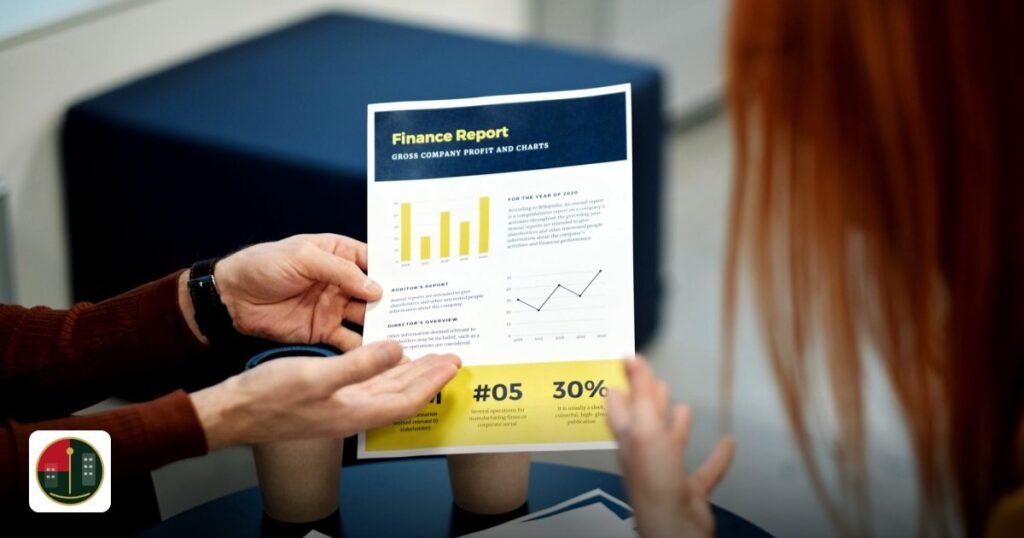 How to Compare UAE Free Zones: 10 Criteria Beyond Cost - two individuals analyzing a finance report chart at a business
